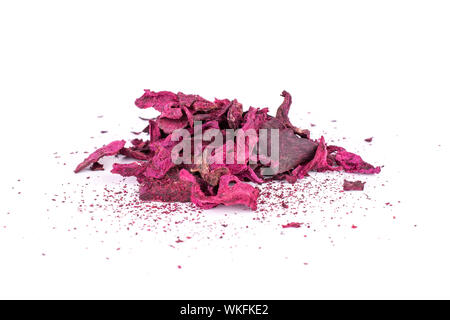 Lot of pieces of dried red beetroot isolated on white background Stock Photo