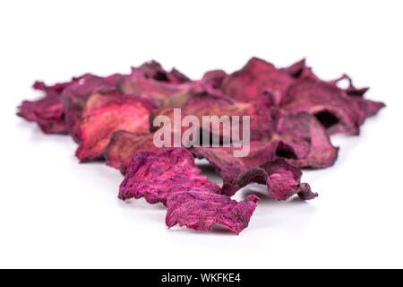 Lot of slices of dried red beetroot isolated on white background Stock Photo