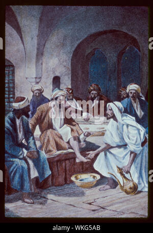 John 13:1-10. Jesus, with the twelve, partaketh of the passover feast in an upper chamber. He teacheth humility by washing the disciples' feet Stock Photo