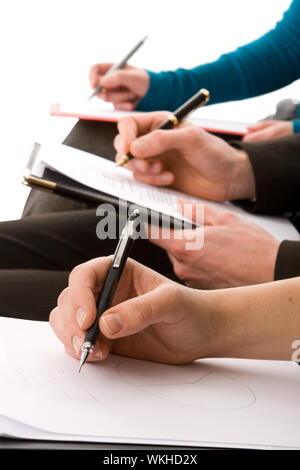 Business people taking notes isolated on white Stock Photo