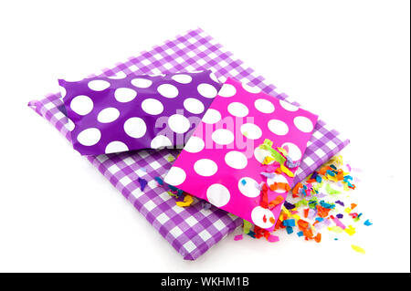 Presents for a birthday in purple with speckles and checkered Stock Photo