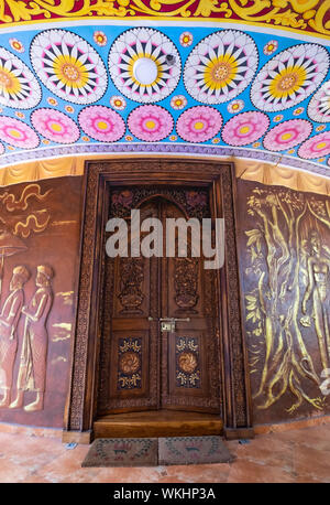 KANDY, SRI LANKA - AUGUST 05-2019: The temple in Kandy city, Sri Lanka. The door made from the wood. It’s one of famous temple for travel. Stock Photo