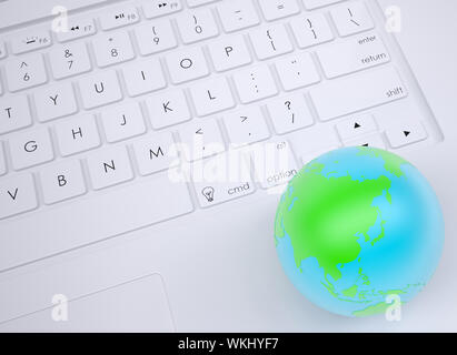 Earth on the keyboard. View from above Stock Photo