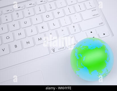 Earth on the keyboard. View from above Stock Photo