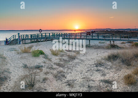 Sunset at the Algarve beach Praia Alvor between Lagos and Portimao Stock Photo