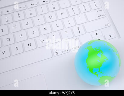 Earth on the keyboard. View from above Stock Photo