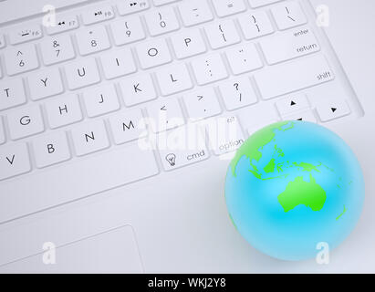 Earth on the keyboard. View from above Stock Photo
