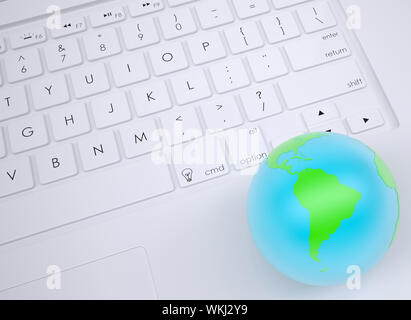Earth on the keyboard. View from above Stock Photo