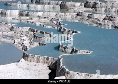 PAMUKKALE, TURKEY - MAY 04, 2010 : The incredible travertines, otherwise known as Cotton Castle. The travertines were formed over thousands of years a Stock Photo