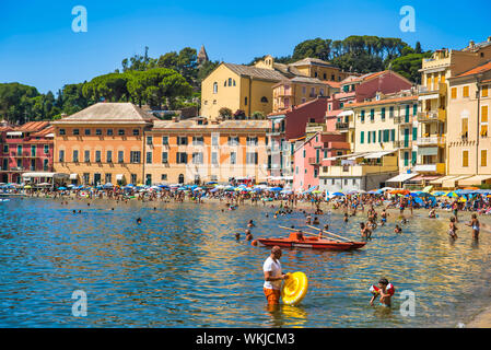 Sestri Levante, Liguria, Italy - August 16, 2019: resort town on the Riviera Levante / Sandy beach on the sea coast with beautiful views / Holidays in Stock Photo