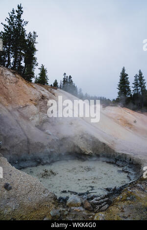 Close up of a bubbling mud pot in the Sulphur Works area of Lassen Volcanic National Park, a geothermal feature Stock Photo