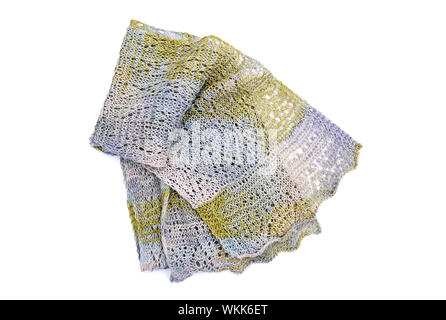 Knitted lace scarf fashion accessory isolated on a white background.  This fiber art is handmade yarn knitted in muted colors of green, blue, mauve. Stock Photo