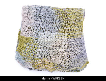 Lace knitted scarf in muted greens, blues and light mauve.  This fashion accessory is folded and isolated on a white background. Stock Photo
