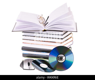 stack of books with pen glasses and a computer mouse Stock Photo