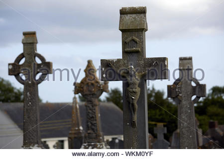 Stone celtic crosses in an Irish graveyard Stock Photo