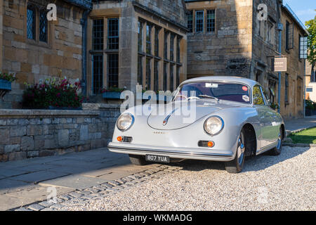 Vintage 1959 Porsche 356A Coupe car outside the Lygon arms hotel. Broadway, Cotswolds, Worcestershire, England Stock Photo