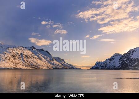 Ersfjord in winter, sunset, snow covered mountains, Ersfjordbotn, Troms, Norway Stock Photo