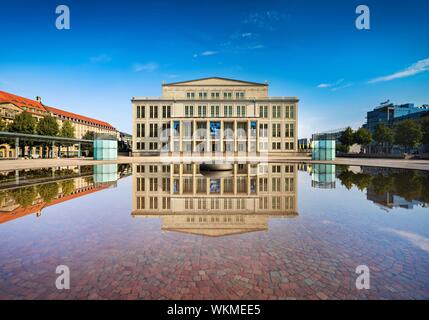 Opera Leipzig with reflection in the water of the Opernbrunnen, Leipzig, Saxony, Germany Stock Photo