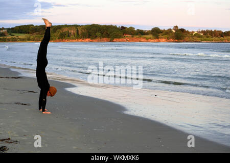 USA man in wetsuit standing shore large spear harpoon Stock Photo - Alamy
