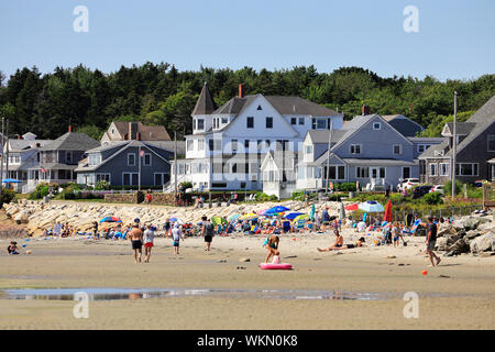 Beach goers on Higgins Beach.Scarborough.Maine.USA Stock Photo