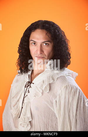 Native American male in a puffy white see-through shirt Stock Photo