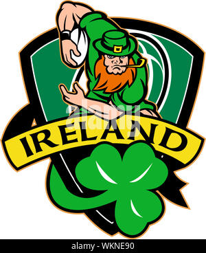 illustration of an Irish leprechaun or rugby player running with ball wearing hat with shamrock or clover leaf  and shield with words 'Ireland' Stock Photo