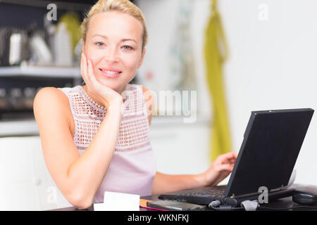 Business woman working from home. Stock Photo