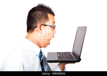Surprised businessman with computer Stock Photo