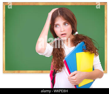 Confused school girl Stock Photo