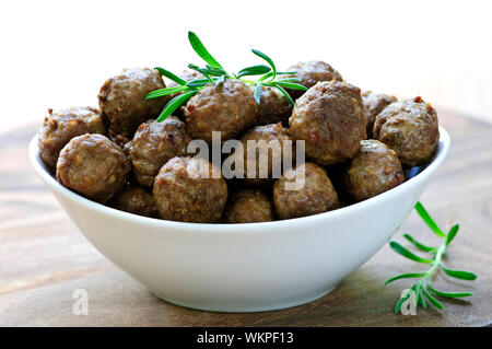 Fresh hot meatball appetizers served in white bowl Stock Photo