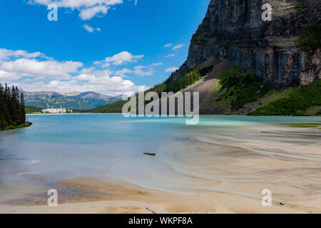 The beautiful Fairmont Chateau Lake Louise and Lake Louise at Banff, Canada Stock Photo