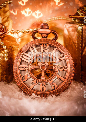 Christmas pocket watch still life. Stock Photo
