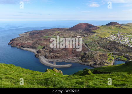 Scenic overlook on Heimaey and Eldfell Volcano, largest island in the Vestmannaeyjar archipelago, south coast of Iceland. Stock Photo