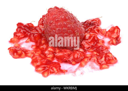Smashed raspberries isolated on white background. High resolution photo. Full depth of field. Stock Photo
