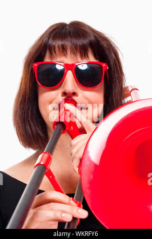 Young Female Musician Playing Trombone - Isolated on White Stock Photo