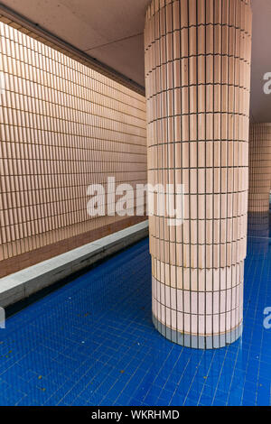One Big Column in Blue Water Structure Stock Photo - Alamy