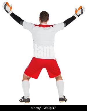 Goalkeeper in white ready to save on white background Stock Photo