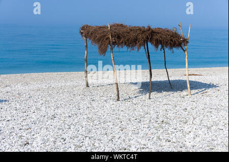 Straw canopy on the beach. Borsh Albania Stock Photo