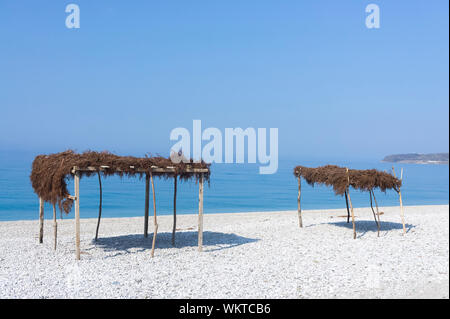 Straw canopy on the beach. Borsh Albania Stock Photo