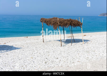 Straw canopy on the beach. Borsh Albania Stock Photo