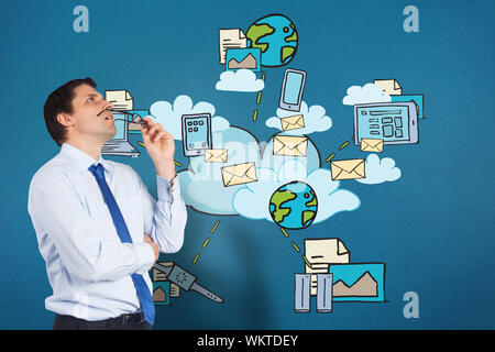Thinking businessman biting glasses against cloud computing doodle Stock Photo