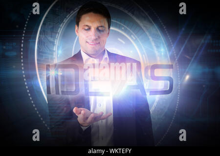 Businessman presenting the word ideas against black background with glowing circle Stock Photo