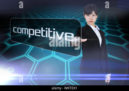 Businesswoman pointing to word competitive against black background with shiny hexagons Stock Photo