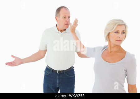 Older couple having an argument on white background Stock Photo