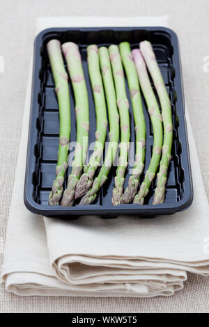 Download Fresh Asparagus In A Plastic Tray Stock Photo Alamy PSD Mockup Templates