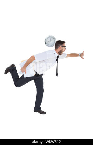 Geeky young businessman running late on white background Stock Photo
