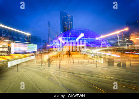 Blur view of central convention complex that is  in arch shape and high rise buildings in construction in the city of Manchester Stock Photo