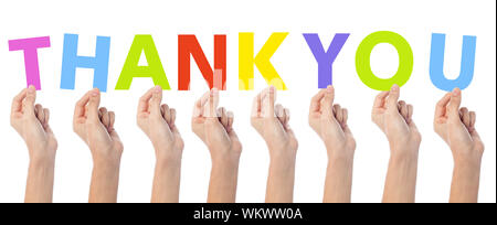 Many hands holding a colorful thank you Stock Photo