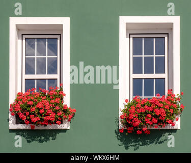 Windows with window boxes with flowers in the village of Gorey, Jersy, Channel Islands. Stock Photo