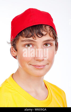 portrait of a teenage boy in red baseball cap -isolated on white Stock Photo
